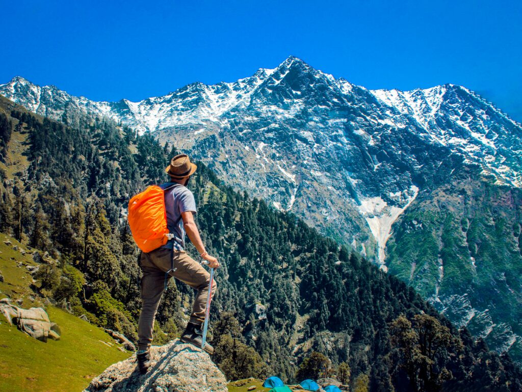 man doing trekking in himalayas